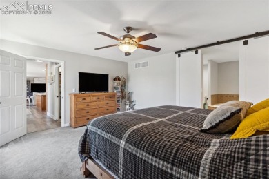 This beautifully updated rancher is a true gem--backing right up on Desert Hawk At Pueblo West in Colorado - for sale on GolfHomes.com, golf home, golf lot