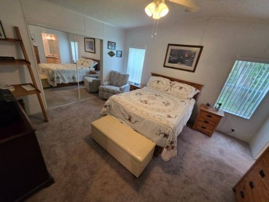This 2 Bedroom, 2 Bathroom is Light and Bright!! The Livingroom on Plantation Golf Club in Florida - for sale on GolfHomes.com, golf home, golf lot