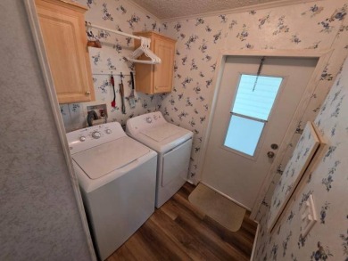 This 2 Bedroom, 2 Bathroom is Light and Bright!! The Livingroom on Plantation Golf Club in Florida - for sale on GolfHomes.com, golf home, golf lot