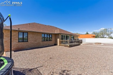 This beautifully updated rancher is a true gem--backing right up on Desert Hawk At Pueblo West in Colorado - for sale on GolfHomes.com, golf home, golf lot