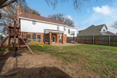 Come and explore this stunning brick residence in Fairway Oaks on Abilene Country Club - South Course in Texas - for sale on GolfHomes.com, golf home, golf lot