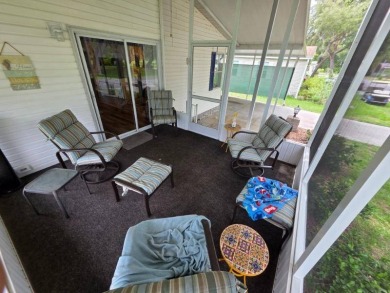 This 2 Bedroom, 2 Bathroom is Light and Bright!! The Livingroom on Plantation Golf Club in Florida - for sale on GolfHomes.com, golf home, golf lot