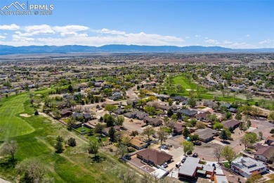This beautifully updated rancher is a true gem--backing right up on Desert Hawk At Pueblo West in Colorado - for sale on GolfHomes.com, golf home, golf lot
