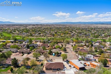 This beautifully updated rancher is a true gem--backing right up on Desert Hawk At Pueblo West in Colorado - for sale on GolfHomes.com, golf home, golf lot