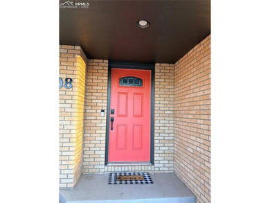 This beautifully updated rancher is a true gem-backing right up on Desert Hawk At Pueblo West in Colorado - for sale on GolfHomes.com, golf home, golf lot