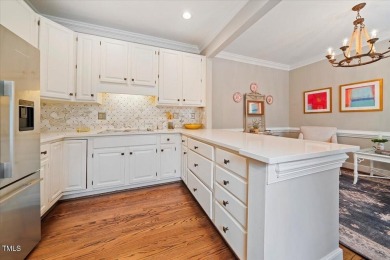 This exquisite brick townhome overlooks the 7th green of the on Lochmere Golf Club in North Carolina - for sale on GolfHomes.com, golf home, golf lot