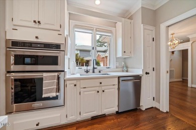 This exquisite brick townhome overlooks the 7th green of the on Lochmere Golf Club in North Carolina - for sale on GolfHomes.com, golf home, golf lot