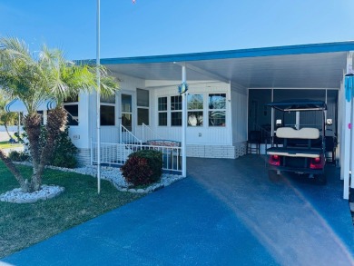 BEAUTIFUL 2-BEDROOM, 2-BATHROOM HOME LOCATED IN FANTASTIC BEACON on Grasslands Golf and Country Club in Florida - for sale on GolfHomes.com, golf home, golf lot