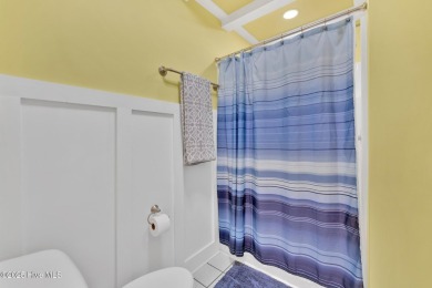 Top-Floor Investment Opportunity - Fully Furnished Condo Just on Oyster Bay Golf Links in North Carolina - for sale on GolfHomes.com, golf home, golf lot