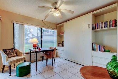 You won't want to miss this first floor 2 bedroom, 2 bath villa on Isla Del Sol Yacht and Country Club in Florida - for sale on GolfHomes.com, golf home, golf lot