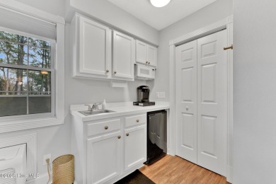 Top-Floor Investment Opportunity - Fully Furnished Condo Just on Oyster Bay Golf Links in North Carolina - for sale on GolfHomes.com, golf home, golf lot
