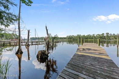 Don't miss this rare opportunity to own a waterfront home with a on Harbour Point Golf Club in North Carolina - for sale on GolfHomes.com, golf home, golf lot