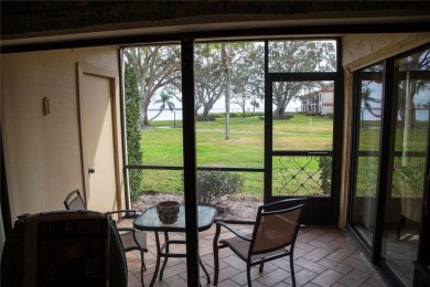 You won't want to miss this first floor 2 bedroom, 2 bath villa on Isla Del Sol Yacht and Country Club in Florida - for sale on GolfHomes.com, golf home, golf lot