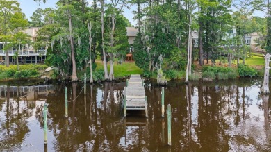Don't miss this rare opportunity to own a waterfront home with a on Harbour Point Golf Club in North Carolina - for sale on GolfHomes.com, golf home, golf lot