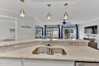 Top-Floor Investment Opportunity - Fully Furnished Condo Just on Oyster Bay Golf Links in North Carolina - for sale on GolfHomes.com, golf home, golf lot
