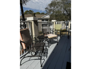 Top-Floor Investment Opportunity - Fully Furnished Condo Just on Oyster Bay Golf Links in North Carolina - for sale on GolfHomes.com, golf home, golf lot