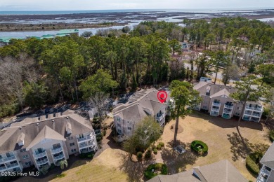 Top-Floor Investment Opportunity - Fully Furnished Condo Just on Oyster Bay Golf Links in North Carolina - for sale on GolfHomes.com, golf home, golf lot