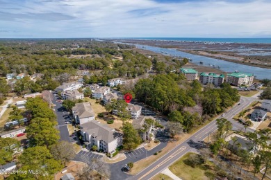Top-Floor Investment Opportunity - Fully Furnished Condo Just on Oyster Bay Golf Links in North Carolina - for sale on GolfHomes.com, golf home, golf lot
