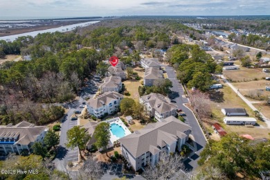 Top-Floor Investment Opportunity - Fully Furnished Condo Just on Oyster Bay Golf Links in North Carolina - for sale on GolfHomes.com, golf home, golf lot