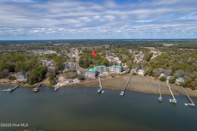 Top-Floor Investment Opportunity - Fully Furnished Condo Just on Oyster Bay Golf Links in North Carolina - for sale on GolfHomes.com, golf home, golf lot