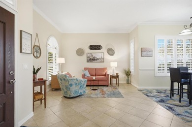 Stunning lake and golf course views from this beautifully on Grand Haven Golf Club in Florida - for sale on GolfHomes.com, golf home, golf lot