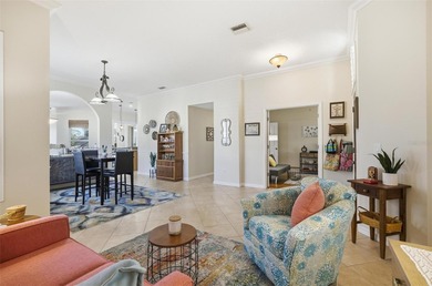 Stunning lake and golf course views from this beautifully on Grand Haven Golf Club in Florida - for sale on GolfHomes.com, golf home, golf lot