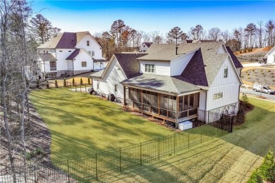 Welcome to this wonderfully modern farmhouse in the stunning on The Governors Towne Club in Georgia - for sale on GolfHomes.com, golf home, golf lot