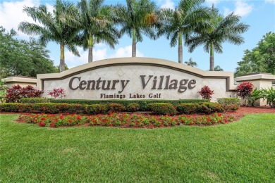 BEAUTIFUL 2 BEDROOMS 2 BATHROOMS LARGE UNIT OVERLOOKING A on Flamingo Lakes Country Club in Florida - for sale on GolfHomes.com, golf home, golf lot