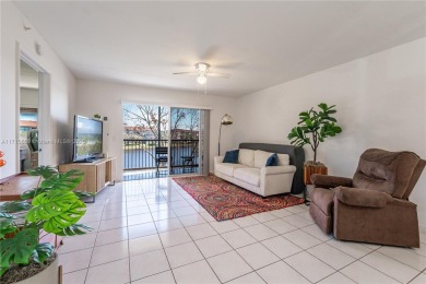 BEAUTIFUL 2 BEDROOMS 2 BATHROOMS LARGE UNIT OVERLOOKING A on Flamingo Lakes Country Club in Florida - for sale on GolfHomes.com, golf home, golf lot