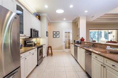 This charming Grand Haven home sits on a desirable corner home on Grand Haven Golf Club in Florida - for sale on GolfHomes.com, golf home, golf lot