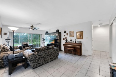 Beautifully located on a quiet cul-de-sac in the village of on Killian Greens Golf Club in Florida - for sale on GolfHomes.com, golf home, golf lot