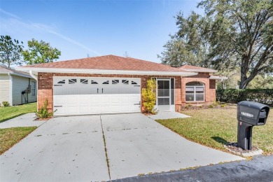 WELCOME HOME to your Meticulously Maintained and renovated home on Tampa Bay Golf and Country Club in Florida - for sale on GolfHomes.com, golf home, golf lot