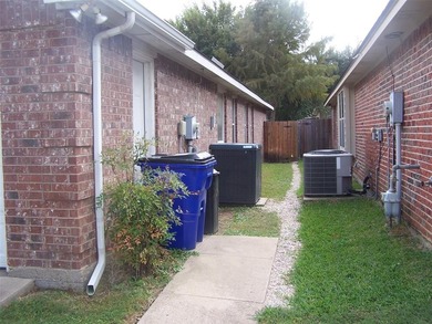 THIS IS A BEAUTIFUL HOME WITH ALL THE EXTRAS IN A GREAT PRIVATE on Mansfield National Golf Club in Texas - for sale on GolfHomes.com, golf home, golf lot