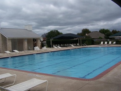 THIS IS A BEAUTIFUL HOME WITH ALL THE EXTRAS IN A GREAT PRIVATE on Mansfield National Golf Club in Texas - for sale on GolfHomes.com, golf home, golf lot