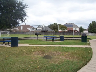 THIS IS A BEAUTIFUL HOME WITH ALL THE EXTRAS IN A GREAT PRIVATE on Mansfield National Golf Club in Texas - for sale on GolfHomes.com, golf home, golf lot