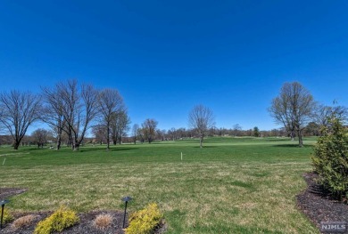 Discover this elegant 3-bedroom townhouse with 3.5 baths on Edgewood Country Club in New Jersey - for sale on GolfHomes.com, golf home, golf lot