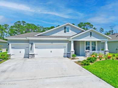 Better Than New - Modern Elegance with Premium Upgrades in on Halifax Plantation Golf Club in Florida - for sale on GolfHomes.com, golf home, golf lot
