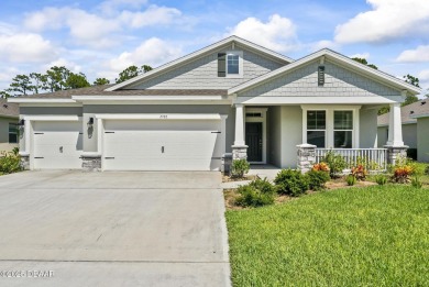 Better Than New - Modern Elegance with Premium Upgrades in on Halifax Plantation Golf Club in Florida - for sale on GolfHomes.com, golf home, golf lot