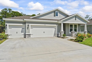Better Than New - Modern Elegance with Premium Upgrades in on Halifax Plantation Golf Club in Florida - for sale on GolfHomes.com, golf home, golf lot