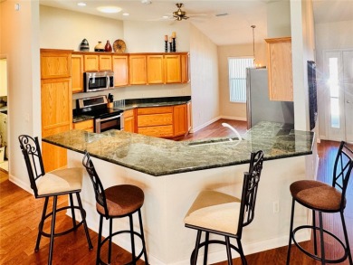 Welcome to this beautifully maintained 3-bedroom, 2-bath on The Links of Spruce Creek in Florida - for sale on GolfHomes.com, golf home, golf lot