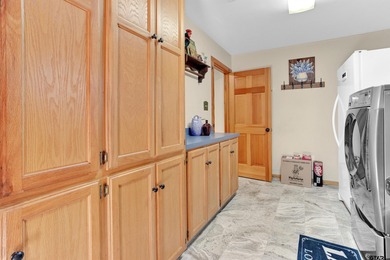 This stunning Satterwhite log home offers 2,550 square feet of on Hide-A-Way Lake Golf Course in Texas - for sale on GolfHomes.com, golf home, golf lot