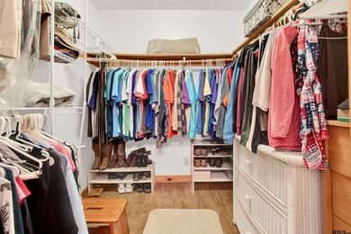 This stunning Satterwhite log home offers 2,550 square feet of on Hide-A-Way Lake Golf Course in Texas - for sale on GolfHomes.com, golf home, golf lot