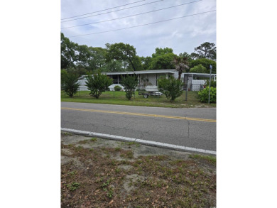Located on a spacious corner lot, this home features a fenced on Prestwick Country Club in South Carolina - for sale on GolfHomes.com, golf home, golf lot