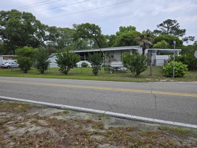 Located on a spacious corner lot, this home features a fenced on Prestwick Country Club in South Carolina - for sale on GolfHomes.com, golf home, golf lot