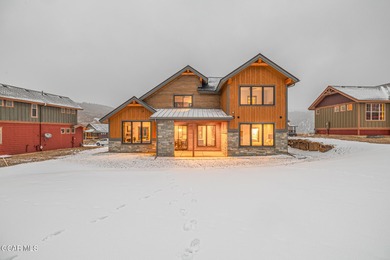 You will love this gorgeous 5-bedroom home with a spacious on Headwaters Golf Course At Granby Ranch in Colorado - for sale on GolfHomes.com, golf home, golf lot
