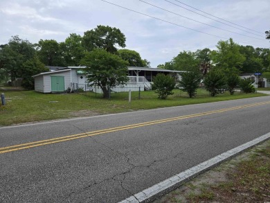 Located on a spacious corner lot, this home features a fenced on Prestwick Country Club in South Carolina - for sale on GolfHomes.com, golf home, golf lot
