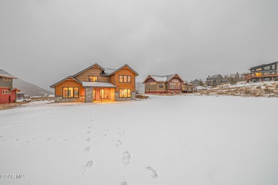 You will love this gorgeous 5-bedroom home with a spacious on Headwaters Golf Course At Granby Ranch in Colorado - for sale on GolfHomes.com, golf home, golf lot