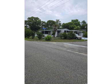 Located on a spacious corner lot, this home features a fenced on Prestwick Country Club in South Carolina - for sale on GolfHomes.com, golf home, golf lot