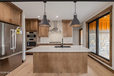 You will love this gorgeous 5-bedroom home with a spacious on Headwaters Golf Course At Granby Ranch in Colorado - for sale on GolfHomes.com, golf home, golf lot