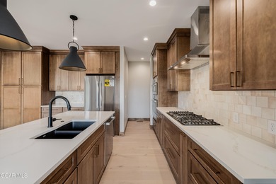 You will love this gorgeous 5-bedroom home with a spacious on Headwaters Golf Course At Granby Ranch in Colorado - for sale on GolfHomes.com, golf home, golf lot